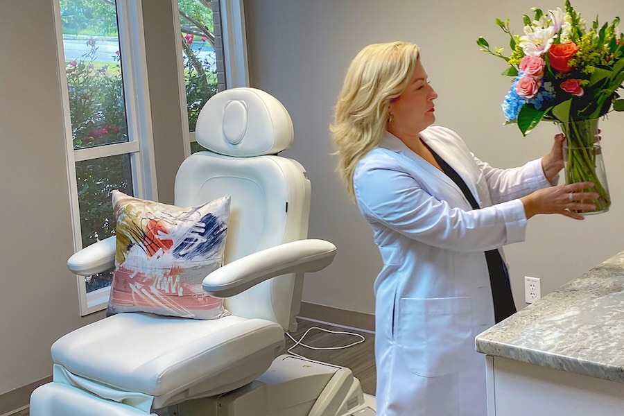 Rachel arranging flowers in her private Richmond boutique